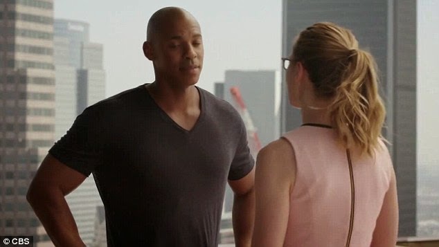 Touching_Kara_shares_a_moment_with_James_Olsen_Mehcad_Brooks